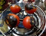 A picture of step 7 of Litti chokha with smokey tomato chutney.