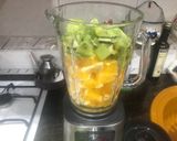 A picture of step 2 of Orange, Kiwi, and Unsweetened Almond Milk Smoothie.