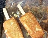 A picture of step 6 of Bread Eggs Lollipop French Toast.