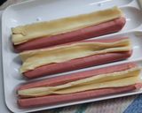 Foto del paso 2 de la receta: Salchichas con queso sobre arroz integral
