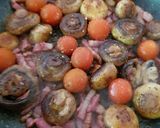 A picture of step 5 of My Butter Fried Pansetta Garlic mushrooms and cherry Tomatoes.
