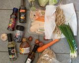 A picture of step 1 of Chicken & rice noodles Asian style salad.