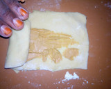 A picture of step 10 of Strawberry and peanut butter rolls.