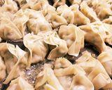 A picture of step 8 of 100 Homemade Vegetable-Filled Pan-Fried Gyoza.