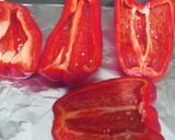 A picture of step 1 of Red Bell Peppers Stuffed with Ham, Cheese, and Egg.