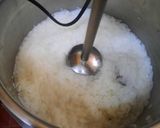 A picture of step 4 of Nolen gurer payesh or Rice kheer with date palm jaggery.