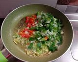 A picture of step 3 of Gobi and Mutter Sabji.