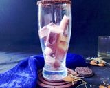 A picture of step 17 of Choco vermicelli mocktail with cocoa cubes.