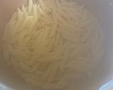 A picture of step 1 of Garlic Chicken Penne Pasta with Spicy Marinara.