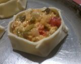 Foto del paso 4 de la receta: Canastas de zapallito, cebolla, queso y tomate