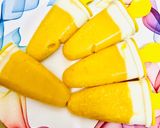 A picture of step 7 of Mango yoghurt Popsicles.