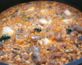 Foto del paso 9 de la receta: Arroz caldoso de rape y salchichas