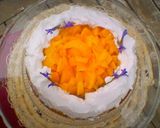 A picture of step 9 of Tres Leches and Peach Layer Cake.