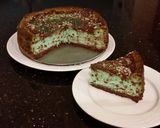A picture of step 26 of Mint Chococolate Chip Cheesecake with a Fudge Brownie Crust.