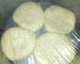 A picture of step 3 of Buns with ovacado,beetrootpaste n cucumber and fruit juice.