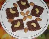 A picture of step 5 of Ghee ke khurchan se bani swadisht mithai.