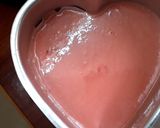A picture of step 3 of Heart shaped rose ice cream cake.