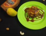 A picture of step 6 of Mango Pancakes with Almonds and Caremal Sauce.