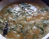 A picture of step 6 of Lasooni Dal Palak with Gondhoraj lebu/ lemon.