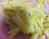 A picture of step 2 of 3 spice fries.