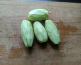 A picture of step 2 of Dudh Potol (Pointed gourd cooked in a milk gravy).