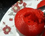 A picture of step 3 of Red cup cakes with chocolate center.