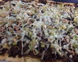 A picture of step 3 of Sig's leeky pizza.