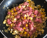 Foto del paso 6 de la receta: Calabacín relleno de carne picada
