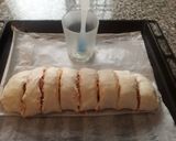 Foto del paso 11 de la receta Pizza de hojaldre enrollada