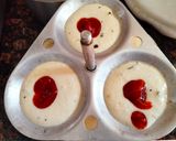 A picture of step 4 of , Chutney and tomato ketchup filled idli.