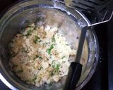 A picture of step 2 of Cheesy chutney stuffed cracker balls.