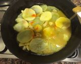 Foto del paso 5 de la receta Merluza con patatas langostinos y calamares