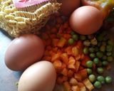 A picture of step 2 of Jollof Vegetable noodles with fried eggs.