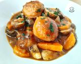 A picture of step 7 of Chicken and Turkey Meatballs with Vegetables.