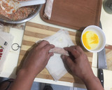 A picture of step 5 of Cheat Day Crispy pork spring rolls.