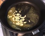 Une image de l'étape 5 de Émincé de pommes de terre à l'ail fumé et persil.