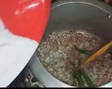A picture of step 1 of Masala Mutton khichdi.