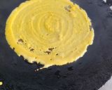 A picture of step 2 of Besan chilla with stuffing.