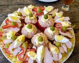 Foto del paso 5 de la receta: Tomates rellenos con salpicón de aves
