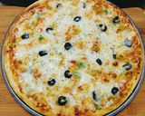 A picture of step 4 of Chicken Tikka Pizza 🍕🍕.