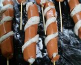 Foto del paso 4 de la receta: Espirales de salchichas con masa saborizadas