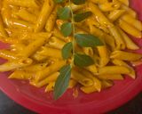 A picture of step 10 of Red sauce cheesy pasta.