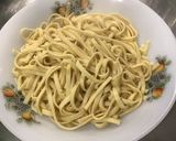 Une image de l'étape 12 de Tagliatelles au saumon, oignon rouge et vodka.