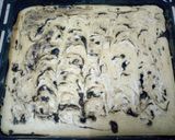 A picture of step 3 of Cinnabon Cinnamon Roll Cake.