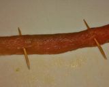 A picture of step 8 of Asparagus wrapped in Meat (Japanese style).
