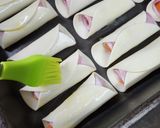 Foto del paso 3 de la receta: Pancitos arrollados con jamón