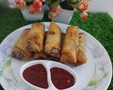 A picture of step 5 of ChickenSpring rolls.