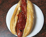 Foto del paso 3 de la receta: Perrito caliente isleño (salteado de cebolla y pimiento) y ketchup