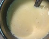 A picture of step 3 of Mango custard with gulab jamun.