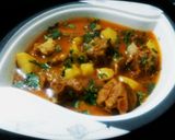 A picture of step 11 of Aloo gosht.